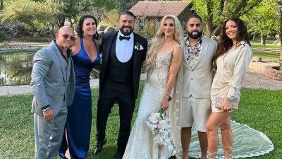 Andrade y Charlotte Flair