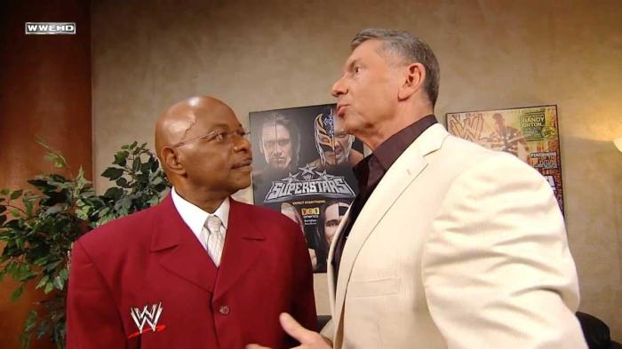 Teddy Long y Vince McMahon