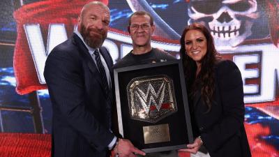 Triple H, Vladimir Abouzeide y Stephanie McMahon