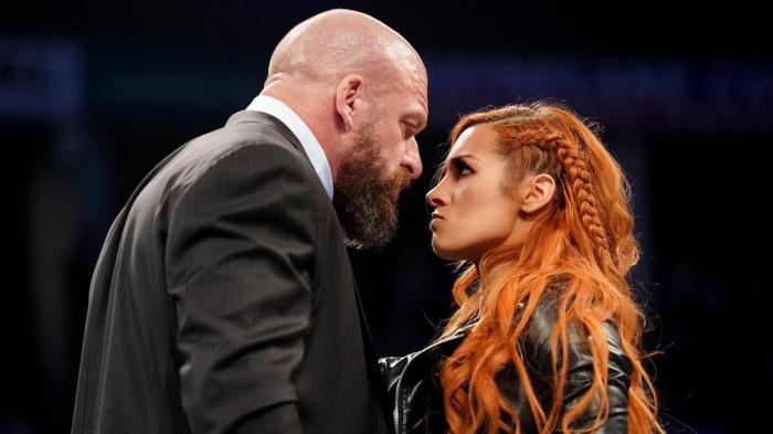 Triple H y Becky Lynch