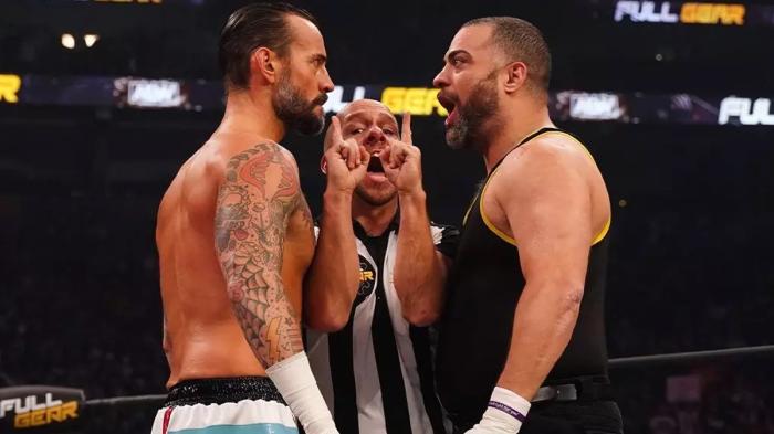 Eddie Kingston y CM Punk 