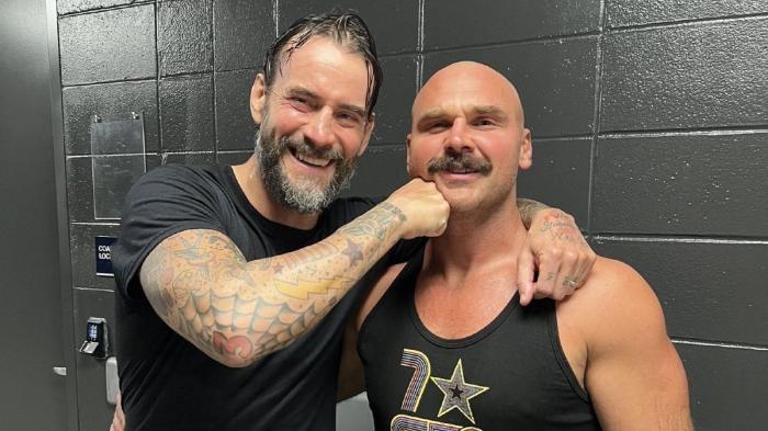 CM Punk y Dax Harwood