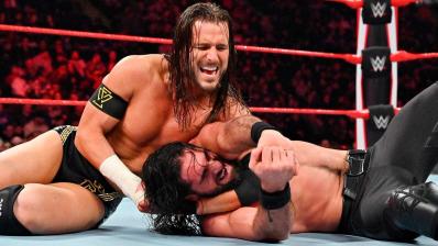 Adam Cole y Seth Rollins