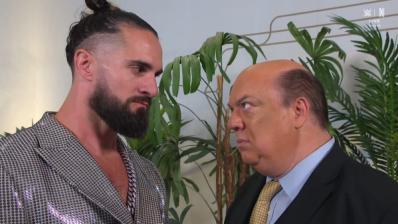 Paul Heyman and Seth Rollins 