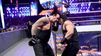 The Undertaker y Roman Reigns